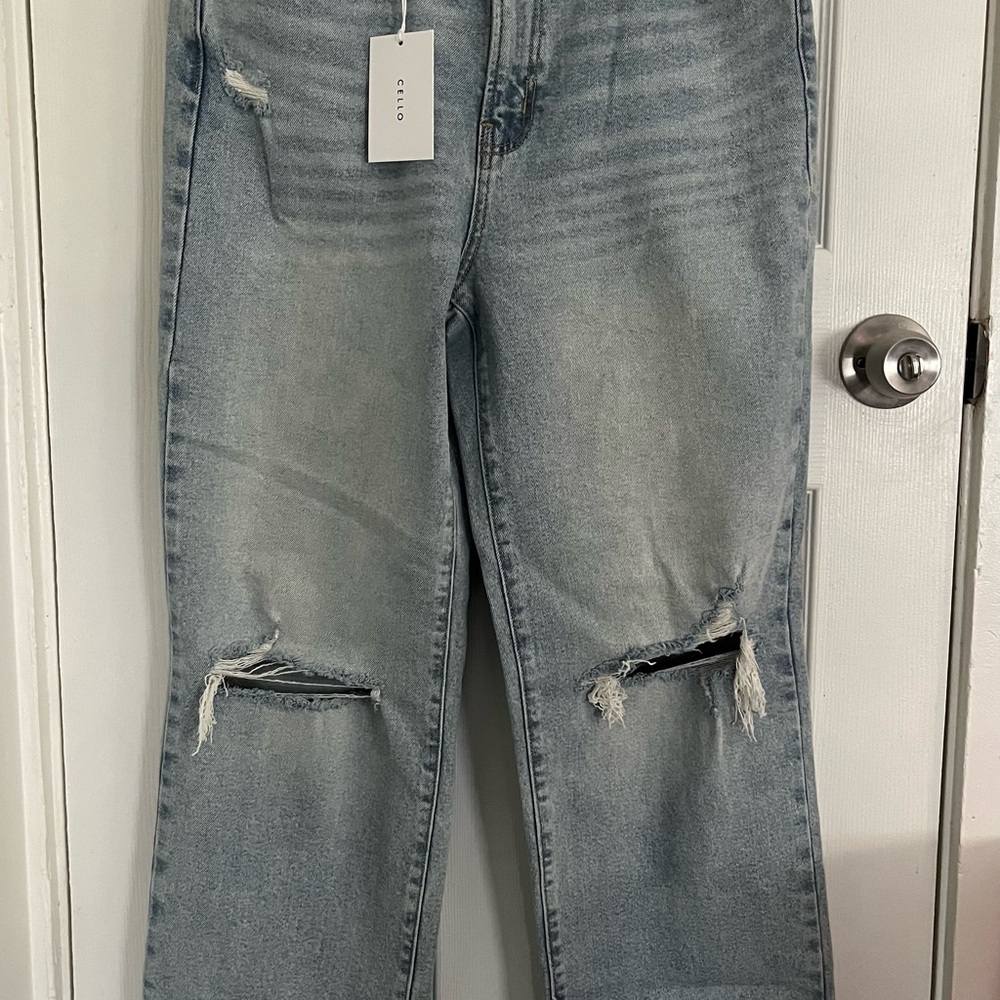 Distressed Light Blue Jeans